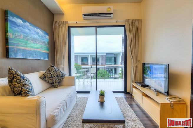The Title | Top Floor Two Bedroom Condo for Sale Across from Rawai Beachfront-1
