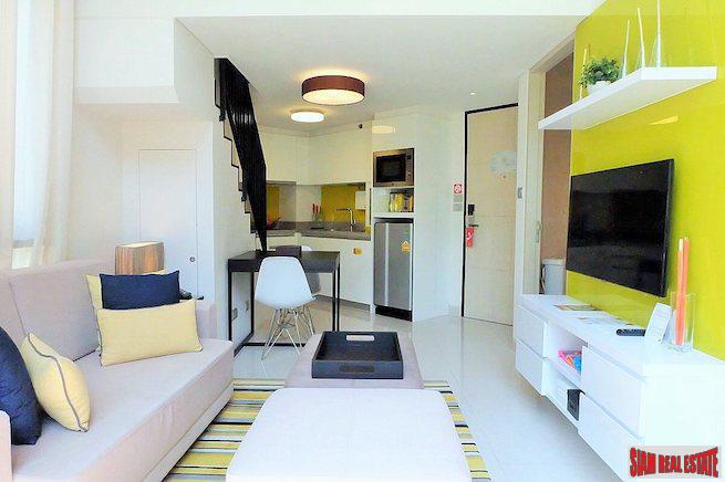 Cassia Residence | Fully Furnished Two Storey One Bedroom Laguna Condo for Sale with Lagoon & Garden Views-0